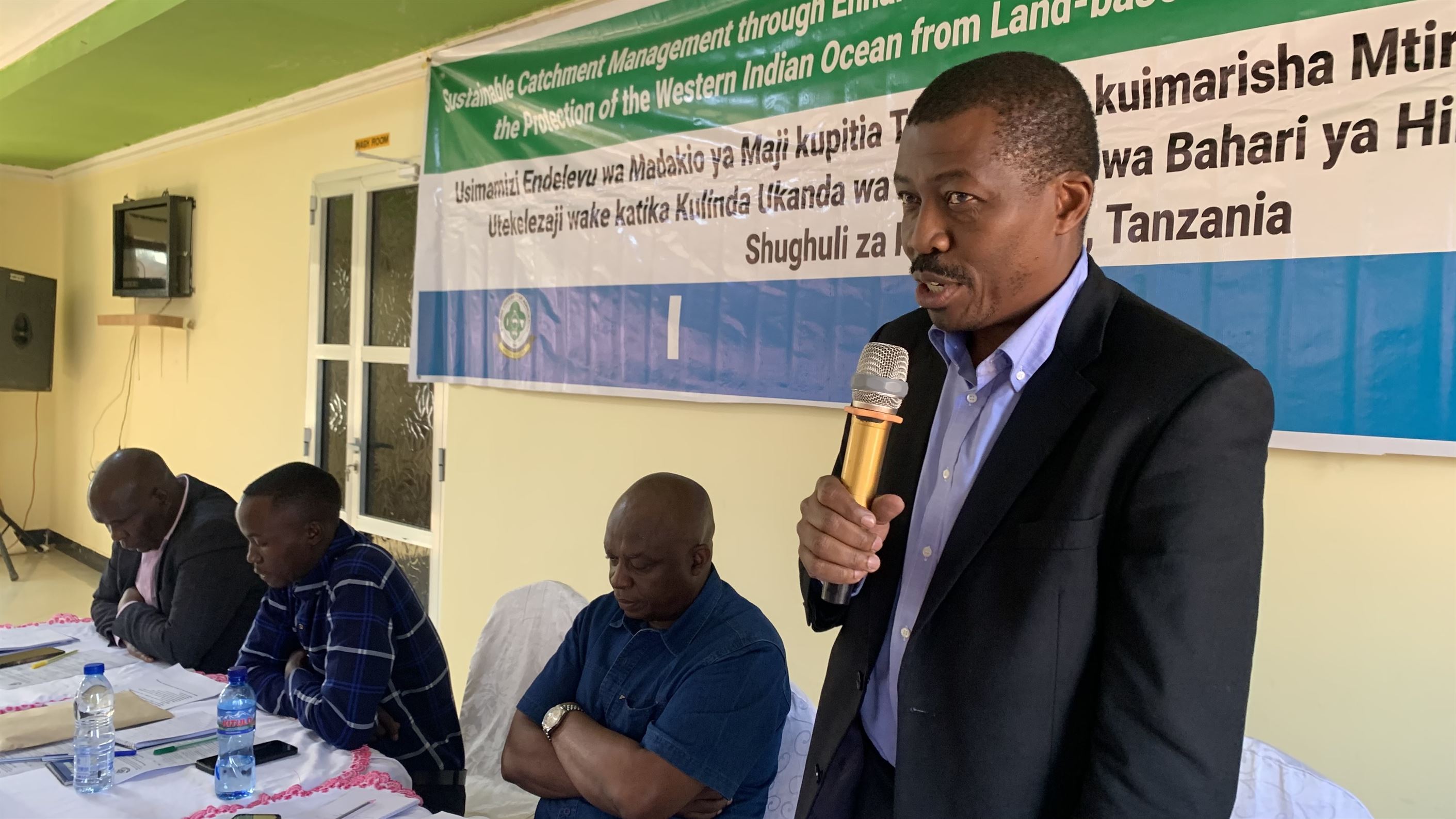 Director of Envoronmental Studies from NEMC, Dr. Menan Jangu speaking on behalf of Director General for NEMC.