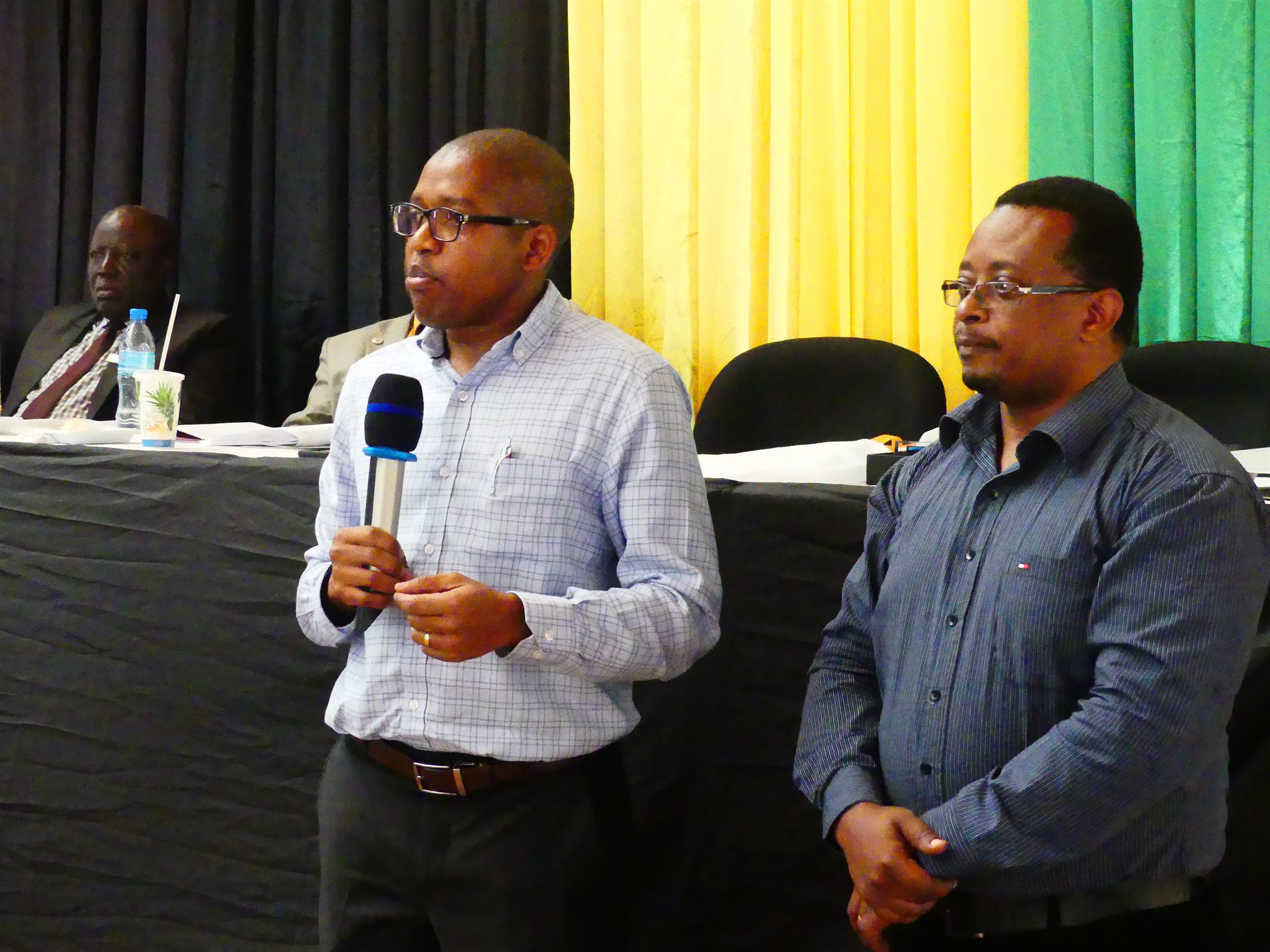 Shambani Graduates Enterprises Limited founders Mr. Victor Mfinanga (left) and and Mr. Flourent Nguma (right) giving their remarks shortly after receiving SUA distinguished Alumni award 