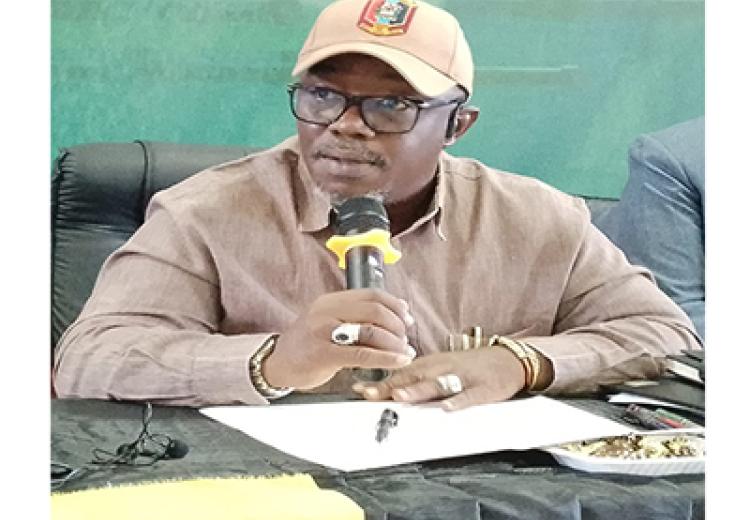 Morogoro Regional Commissioner Adam Malima talking to creative youth.